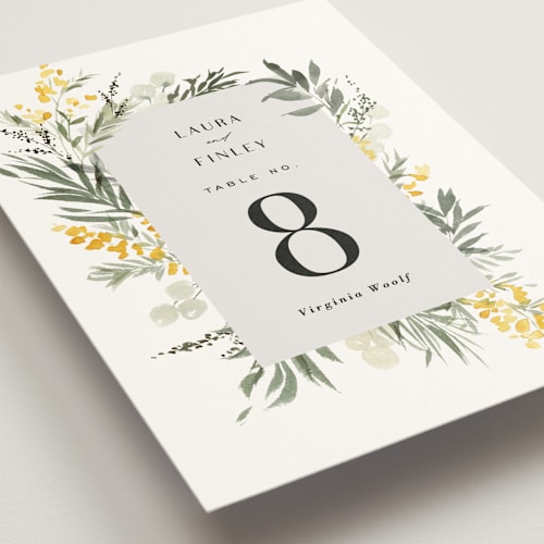 This is a dandelion table numbers with standard by Everett Paper Goods called mimosa printing on doublethick in standard