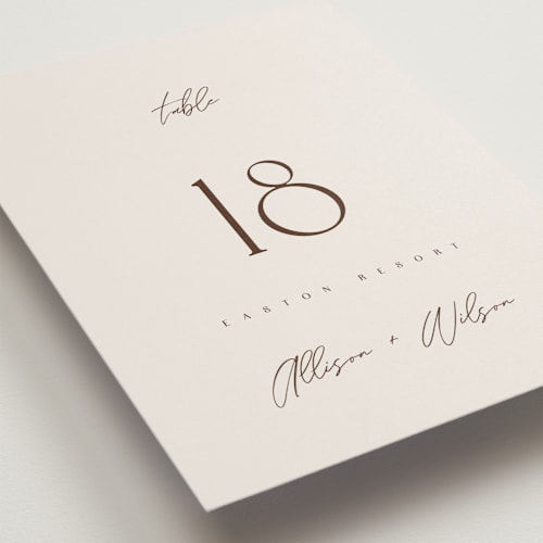 This is a ecru table numbers with standard by AK Graphics called love note printing on doublethick in standard