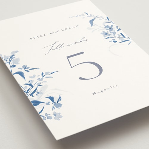 This is a cobalt table numbers with standard by Everett Paper Goods called fleur printing on doublethick in standard