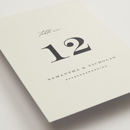 This is a ivory table numbers with standard by Carolyn Nicks called softly swept printing on doublethick in standard