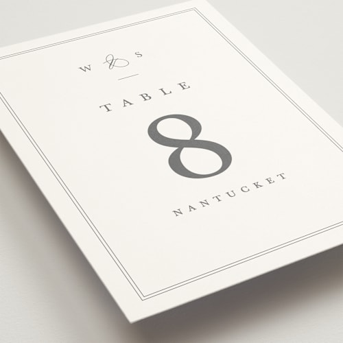 This is a ivory table numbers with standard by Amy Kross called crawford printing on doublethick in standard