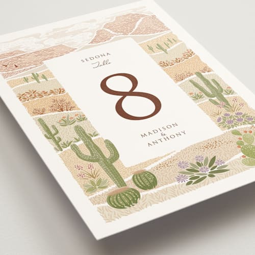 This is a red rock table numbers with standard by Paper Sun Studio called westward printing on doublethick in standard