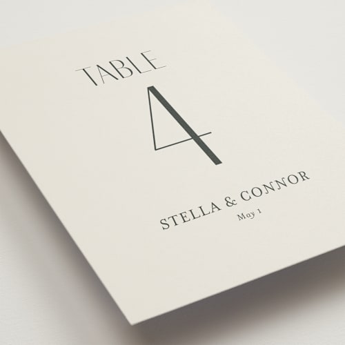 This is a porcelain table numbers with standard by Jennifer Postorino called unity printing on doublethick in standard