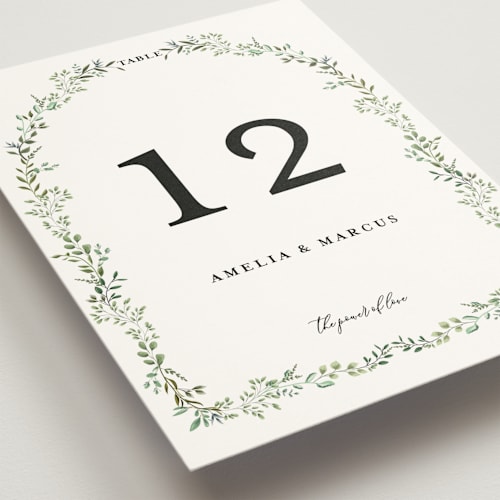 This is a mojito table numbers with standard by Susan Moyal called monogramed arch printing on doublethick in standard