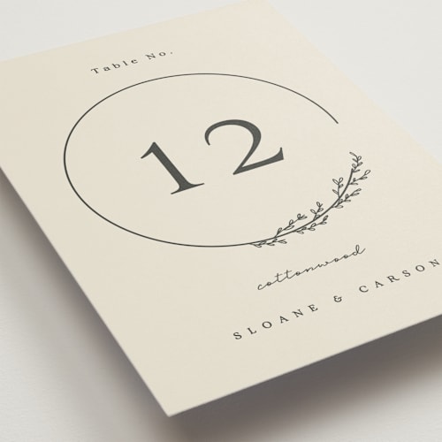This is a almond table numbers with standard by Brianne Larsen called branched printing on doublethick in standard