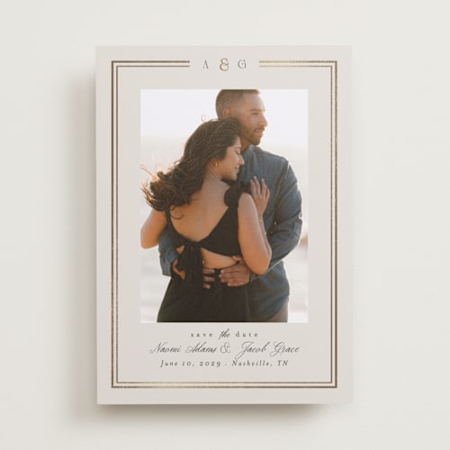 This is a champagne foil stamped save the date cards with foil pressed by Nicole Walsh called grace printing on recycled smooth signature in standard