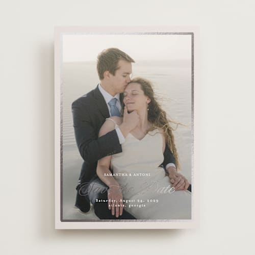 This is a antique foil stamped save the date cards with foil pressed by Nicole Walsh called tux printing on recycled smooth signature in standard