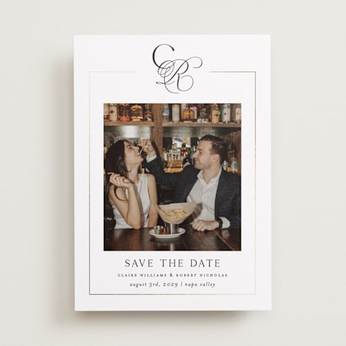 This is a silk foil stamped save the date cards with foil pressed by Kelly Schmidt called monogram script printing on recycled smooth signature in standard