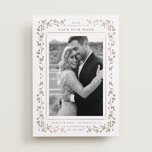 This is a snow foil stamped save the date cards with foil pressed by Ana de Sousa called fairytale printing on recycled smooth signature in standard
