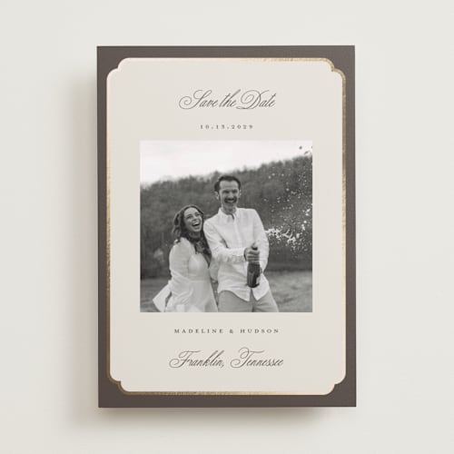 This is a cognac foil stamped save the date cards with foil pressed by Emily Betts called arch frame printing on recycled smooth signature in standard