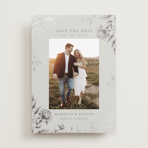 This is a steel foil stamped save the date cards with foil pressed by Chris Griffith called wildflower date printing on recycled smooth signature in standard