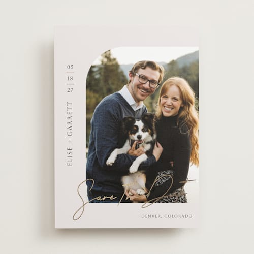 This is a sandstone foil stamped save the date cards with foil pressed by That Girl Press called modern arch printing on recycled smooth signature in standard