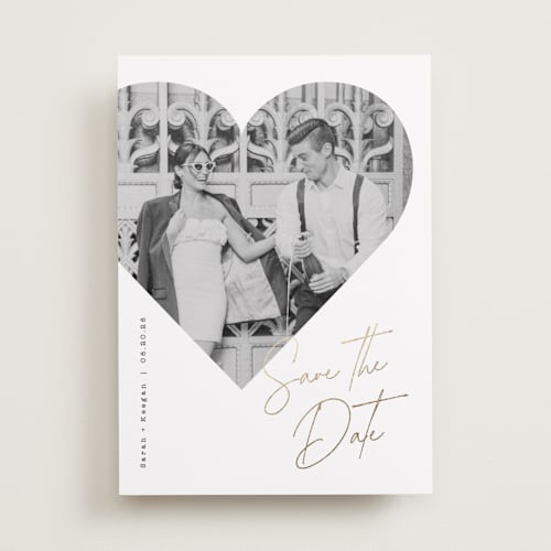 This is a snow foil stamped save the date cards with foil pressed by Sarah Curry called hearted printing on recycled smooth signature in standard