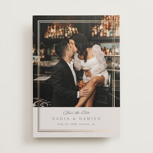 This is a linen foil stamped save the date cards with foil pressed by Nicole Walsh called shimmer printing on recycled smooth signature in standard