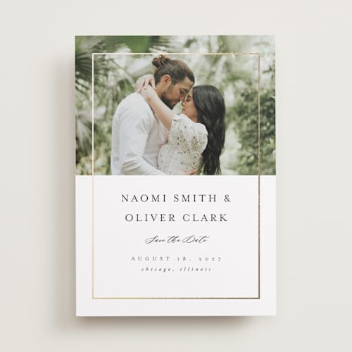 This is a pearl foil stamped save the date cards with foil pressed by Nicole Walsh called gilded frame printing on recycled smooth signature in standard