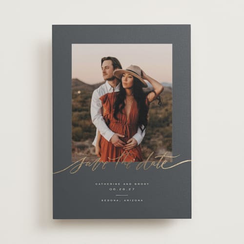 This is a night sky foil stamped save the date cards with foil pressed by Wildfield Paper Co called midnight printing on recycled smooth signature in standard