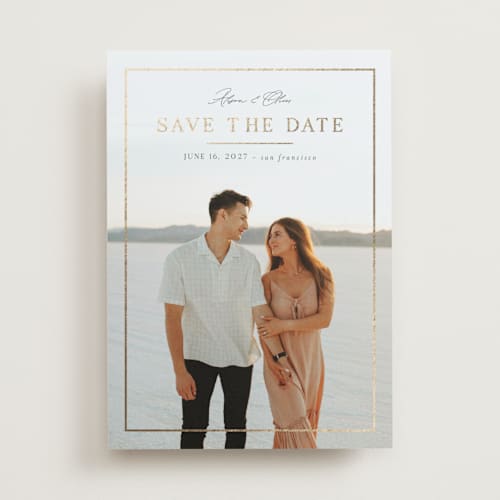 This is a shell foil stamped save the date cards with foil pressed by Nicole Walsh called surrounded by love printing on recycled smooth signature in standard