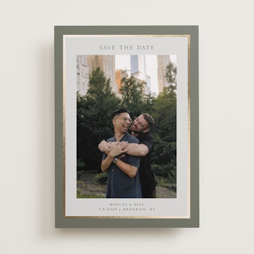 This is a sage foil stamped save the date cards with foil pressed by Nicole Walsh called foil frame printing on recycled smooth signature in standard