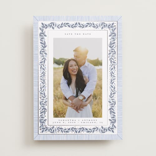 This is a periwinkle foil stamped save the date cards with foil pressed by Jenna Holcomb called antique greenery printing on recycled smooth signature in standard