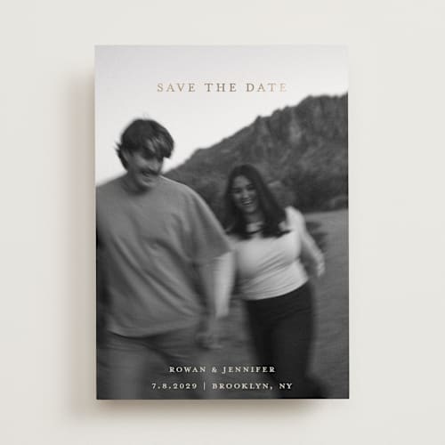 This is a buttercream foil stamped save the date cards with foil pressed by Carolyn Hunt called golden merry printing on recycled smooth signature in standard