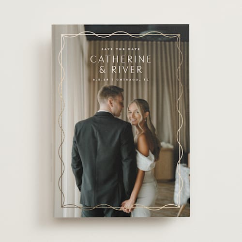 This is a silk foil stamped save the date cards with foil pressed by Lauren Chism called delicate frame printing on recycled smooth signature in standard