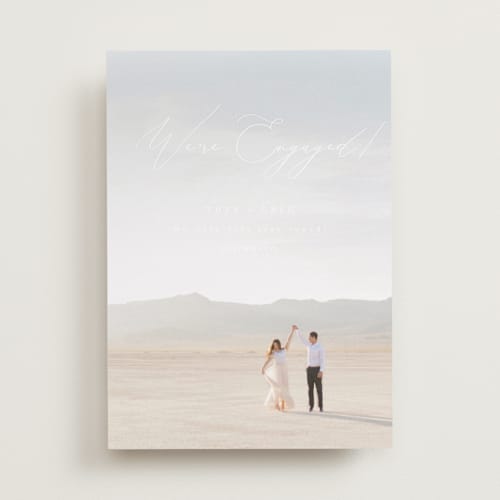 This is a snow save the date with standard by Snow and Ivy called enchantment printing on recycled smooth signature in standard