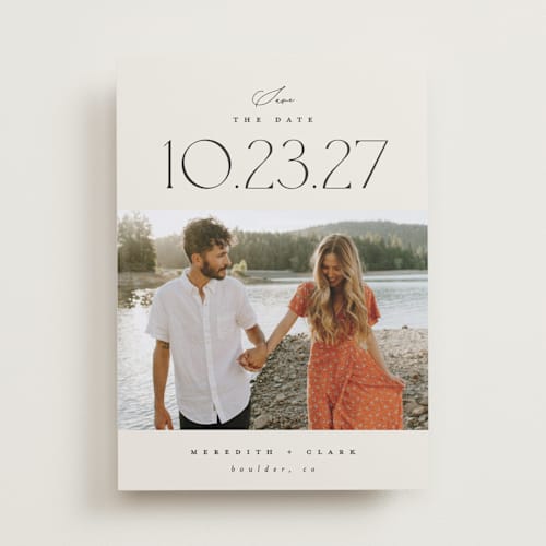 This is a ivory save the date with standard by Carolyn Nicks called romancing the date printing on recycled smooth signature in standard