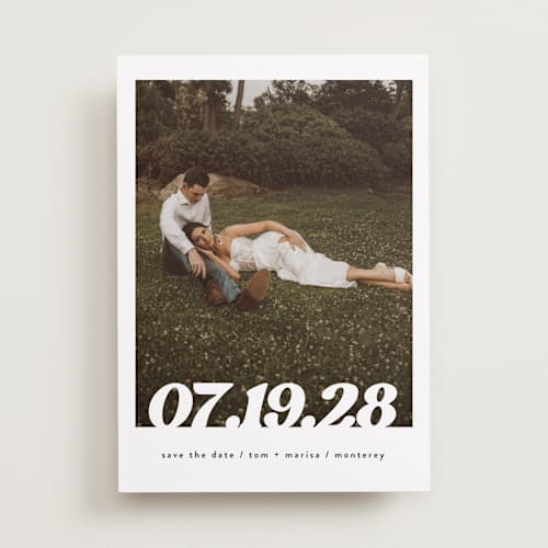 This is a pearl save the date with standard by Christie Garcia called sidele printing on recycled smooth signature in standard