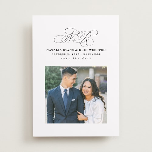 This is a newspaper save the date with standard by Lea Delaveris called elegant initials printing on recycled smooth signature in standard
