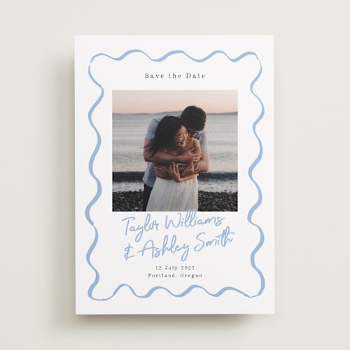 This is a dusty blue save the date with standard by Cass Loh called handdrawn wavy frame printing on recycled smooth signature in standard