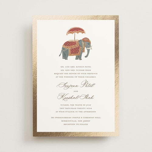 This is a milk foil stamped wedding invitations with foil pressed by Teju Reval called indian elephant printing on signature in standard