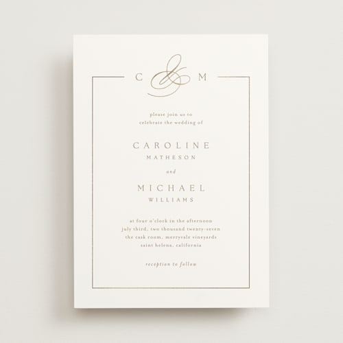 This is a golden foil stamped wedding invitations with foil pressed by Kelly Schmidt called framed monogram printing on signature in standard