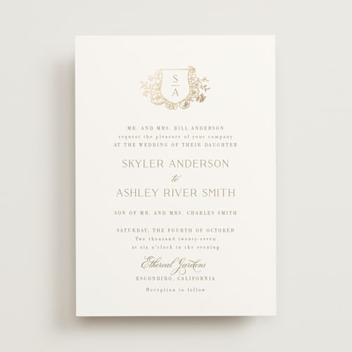 This is a champagne foil stamped wedding invitations with foil pressed by Cass Loh called floral crest printing on signature in standard