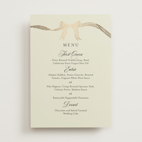 This is a champagne menu cards with foil pressed by Chris Griffith called all tied up printing on signature in 5x7