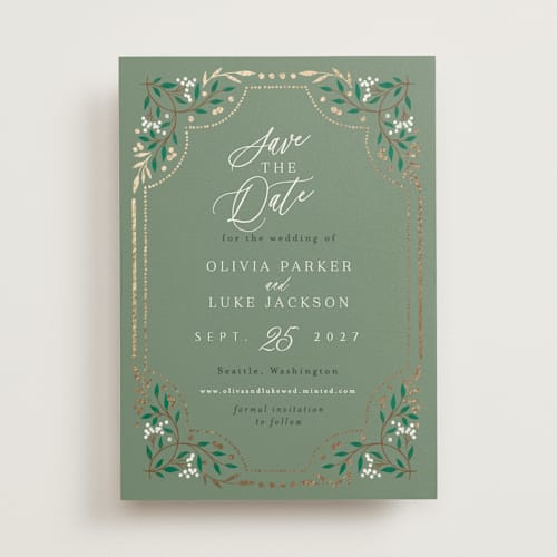 This is a evergreen foil stamped save the date cards with foil pressed by Alethea and Ruth called illuminated storybook printing on signature in standard