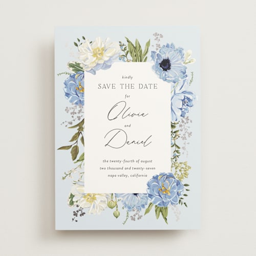 This is a azure foil stamped save the date cards with foil pressed by Susan Moyal called timeless blooms printing on signature in standard