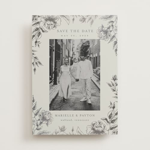 This is a steel foil stamped save the date cards with foil pressed by Chris Griffith called wildflower date printing on signature in standard