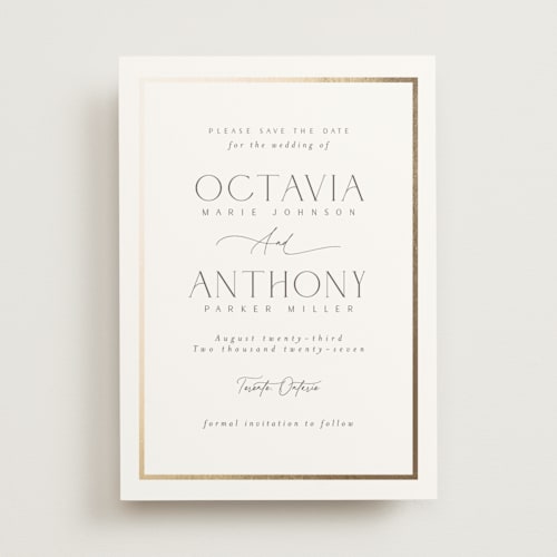 This is a porcelain foil stamped save the date cards with foil pressed by Nicole Walsh called regal printing on signature in 5x7