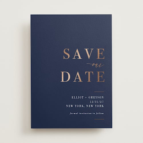 This is a navy foil stamped save the date cards with foil pressed by Sarah Wilde called greyson printing on signature in standard