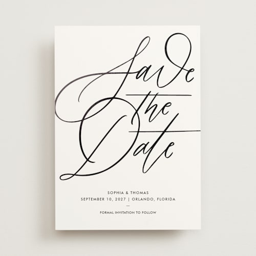 This is a snow foil stamped save the date cards with foil pressed by Kristen Smith called delicate dates printing on signature in standard