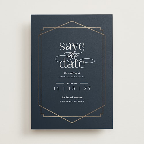 This is a navy foil stamped save the date cards with foil pressed by Carly Reed Walker called vision printing on signature in standard