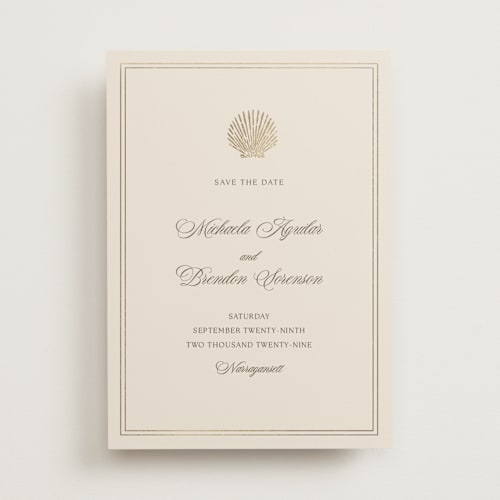 This is a champagne foil stamped save the date cards with foil pressed by Griffinbell Paper Co. called seaside printing on signature in standard