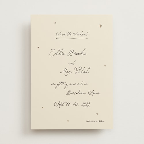 This is a noir foil stamped save the date cards with foil pressed by Ani Somi called written in the stars printing on signature in standard