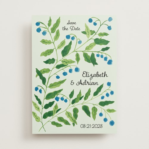This is a mint save the date with standard by Claire called lily of the valley printing on signature in standard
