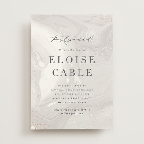 This is a taupe save the date with standard by Hooray Creative called moody marbling printing on signature in standard