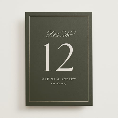 This is a deep olive table numbers with foil pressed by Nicole Walsh called refined printing on doublethick in standard