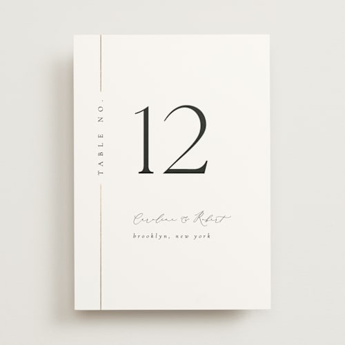 This is a classic table numbers with foil pressed by Kelly Schmidt called london printing on doublethick in standard