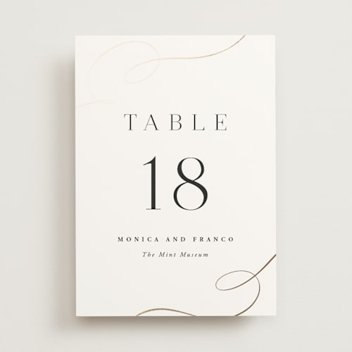 This is a cloud table numbers with foil pressed by Hooray Creative called and centered printing on doublethick in standard