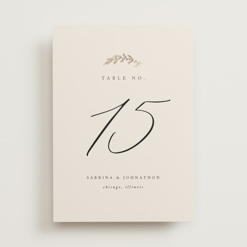 This is a ivory table numbers with foil pressed by Carolyn Nicks called to hold printing on doublethick in standard