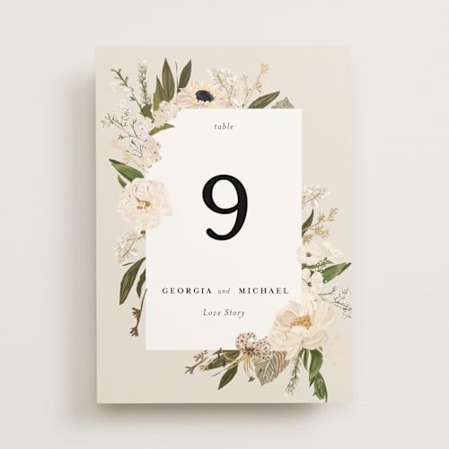 This is a champagne table numbers with foil pressed by Susan Moyal called harmony printing on doublethick in standard